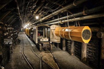 Hard coal mine underground corridor with steel support system and electrical equipment, Bochum, Germany